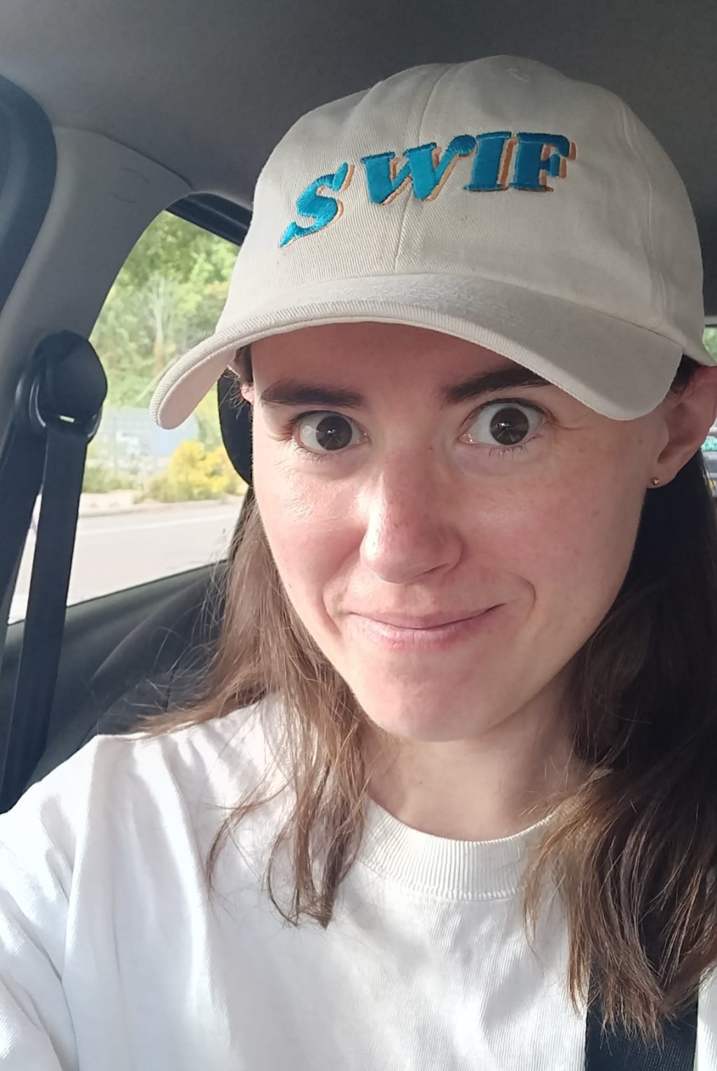 Holly wearing a SWIF cap